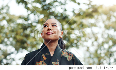 Woman, thinking and relax in park for peace, idea and mindset for martial arts practice in Tokyo. Japanese samurai, daydreaming and reflection in nature with nostalgia, memories and culture in sport Woman, thinking and relax in park for peace, idea and mindset for martial arts practice in Tokyo. Japanese samurai, daydreaming and reflection in nature with nostalgia, memories and culture in sport 121016976