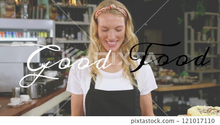 Smiling woman in apron with Good Food text image over cafe background 121017110