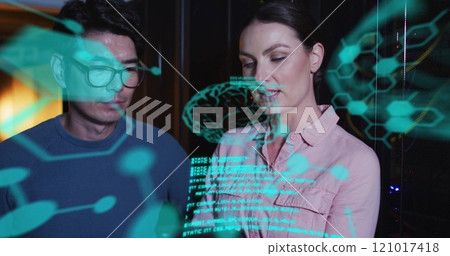 Image of data processing with brains over diverse colleagues using tablet in server room 121017418