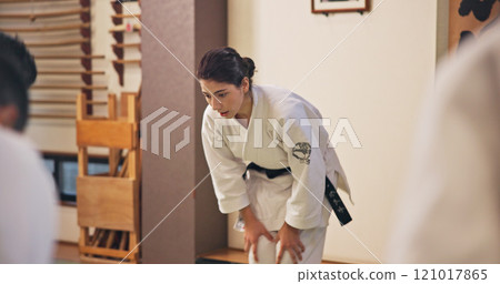 Martial arts, woman and bow with respect in dojo for honor, self defense training and discipline in class. Japanese culture, aikido and person with traditional greeting for etiquette and gratitude Martial arts, woman and bow with respect in dojo for honor, self defense training and discipline in class. Japanese culture, aikido and person with traditional greeting for etiquette and gratitude 121017865