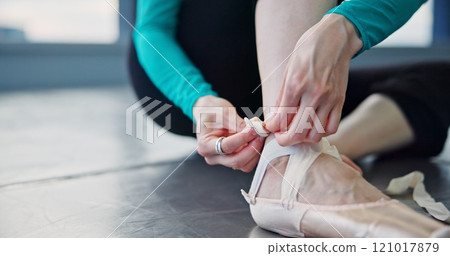 Hands, person and tying shoe of ballet practice, dancing rehearsal and ready for art performance in class. Dancer, pointe ribbon and preparation of contemporary fitness, balance and creative in Japan 121017879