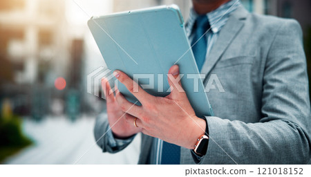 Businessman, hands and browsing with tablet in city for research, business updates or network. Japan, man or closeup with technology or app for communication, online search or news in an urban town 121018152