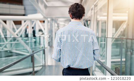 Office, walking and back of businessman with opportunity, professional career and corporate planning. Hallway, employee and consultant in lobby for task, morning or arrival in workplace in Japan 121018220
