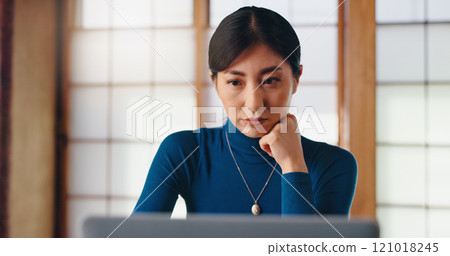 Laptop, writer or Asian woman in home office for reading remote work, research or website. Report, female author or freelancer editing article online for campaign, blog or publishing review in Japan 121018245