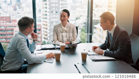 Discussion, client and people in boardroom, documents and negotiation for business deal and talking. Office, conversation and group with paperwork for proposal, research and sales manager in Japan Discussion, client and people in boardroom, documents and negotiation for business deal and talking. Office, conversation and group with paperwork for proposal, research and sales manager in Japan 121018488