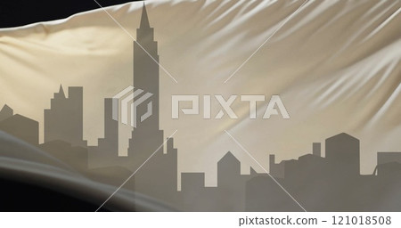 Image of silhouette of cityscape and floating cloth on black background 121018508