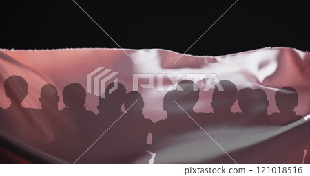 Image of silhouettes of people and floating cloth on black background 121018516