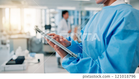 Medical, scrubs and tablet with hands of nurse in hospital for diagnosis, research or telehealth. Healthcare, internet and technology with medicine professional person closeup at clinic in Japan 121018796