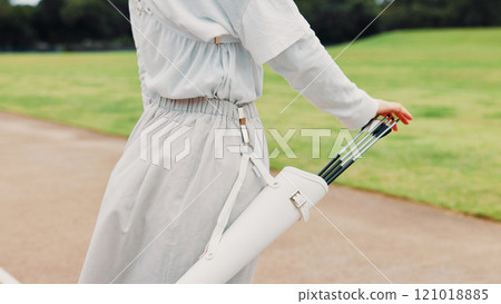 Hands, arrow and training for archery, game and preparing for competition, equipment and outdoor for sport. Contest, athlete and practice from tournament, skills and challenge for person in Japan 121018885