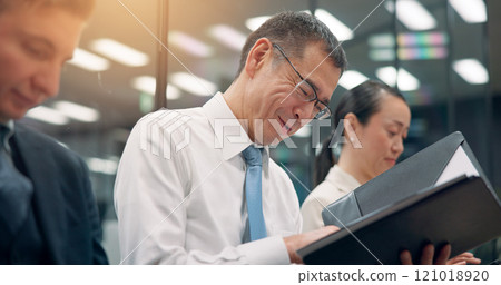 Happy man, waiting room and interview with documents in row for business resume, cv or application at office. Japan, male person or candidate with smile or paperwork for job or career opportunity Happy man, waiting room and interview with documents in row for business resume, cv or application at office. Japan, male person or candidate with smile or paperwork for job or career opportunity 121018920