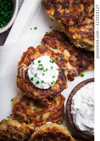 Hanukkah latkes - Jewish potato pancakes. Hanukkah latkes - Jewish potato pancakes. 121019127
