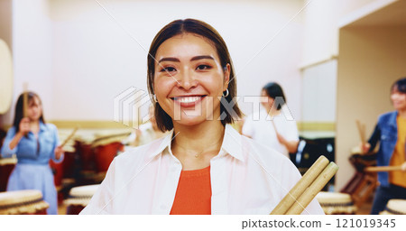 Portrait, Japanese woman and instrument of teaching music, community practice and art performance. Teacher, arms crossed and drum sticks of festival band, spiritual ritual and wadaiko talent in Japan 121019345