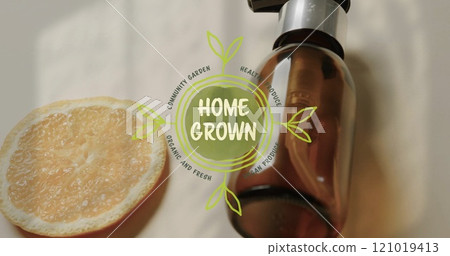 Image of home grown text and logo over lemon slice and beauty oil pump bottle 121019413