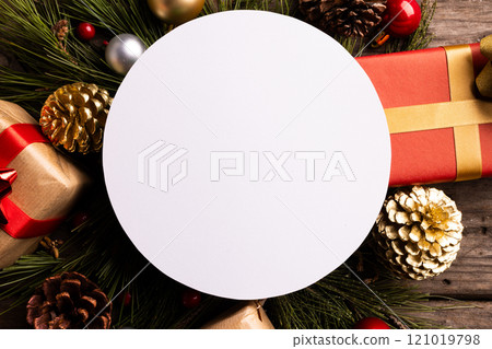 Christmas decorations with white tag and copy space on wooden background Christmas decorations with white tag and copy space on wooden background 121019798