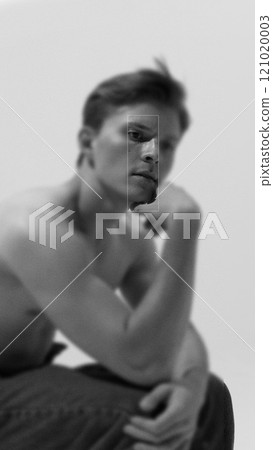 Contemporary art collage. Male gaze with sharp focus, radiating clarity and strength. Black and white. Blur filter. Contemporary art collage. Male gaze with sharp focus, radiating clarity and strength. Black and white. Blur filter. 121020003