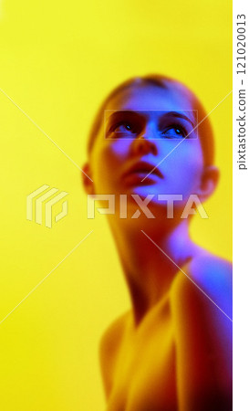 Contemporary art collage. Subtle gaze of young woman, exuding calm and connection. Warm light and soft edges create harmonious, understated visual flow. 121020013