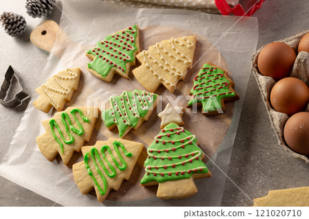 Decorated christmas cookies with copy space on grey background Decorated christmas cookies with copy space on grey background 121020710