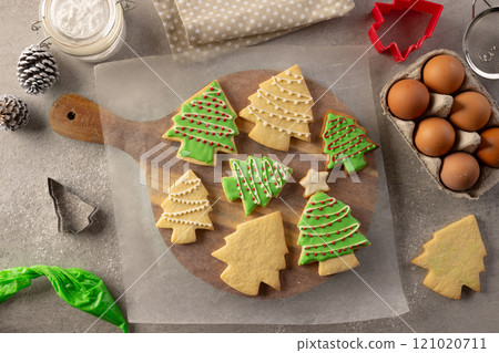 Decorated christmas cookies with copy space on grey background Decorated christmas cookies with copy space on grey background 121020711