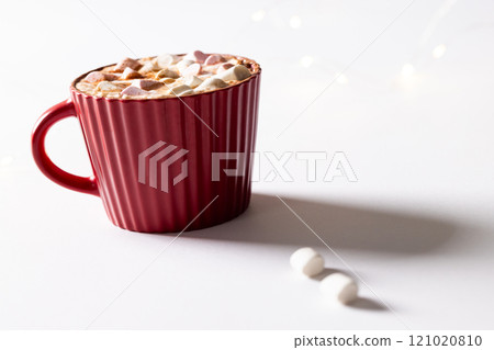 Red christmas mug of chocolate and marshmallows with copy space 121020810
