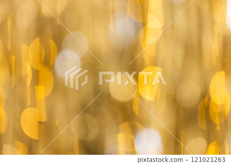 Multiple yellow bokeh lights with copy space on yellow background 121021263
