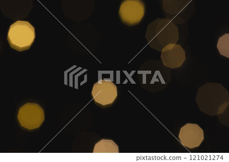 Multiple yellow bokeh lights with copy space on dark background Multiple yellow bokeh lights with copy space on dark background 121021274