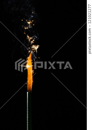 Close up of gas lighter with flames and copy space on black background Close up of gas lighter with flames and copy space on black background 121021277