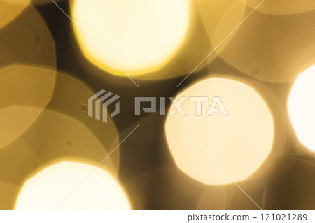 Multiple yellow bokeh lights with copy space on dark background 121021289