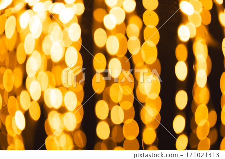 Multiple yellow bokeh lights with copy space on dark background 121021313