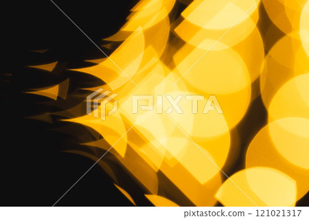 Multiple yellow bokeh lights with copy space on dark background Multiple yellow bokeh lights with copy space on dark background 121021317
