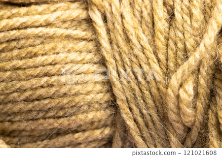 Micro close up of beige wool threads with copy space Micro close up of beige wool threads with copy space 121021608