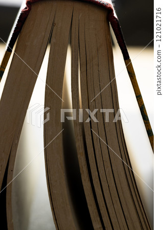 Micro of book pages and copy space on grey background Micro of book pages and copy space on grey background 121021716