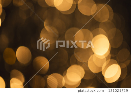 Yellow bokeh lights with copy space on dark background Yellow bokeh lights with copy space on dark background 121021729
