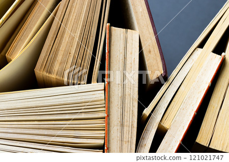 Micro of books and copy space on grey background 121021747
