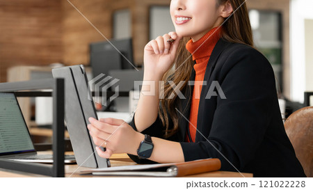 Woman doing desk work / business woman 121022228