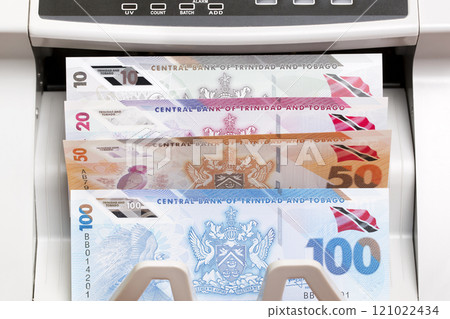 Trinidad and Tobago dollar in the counting machine 121022434
