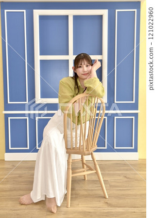 Portrait of a relaxing young woman 121022960