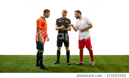 Referee writes in his notebook as two players, in orange and white jerseys, point and argue during match, isolated on white background Referee writes in his notebook as two players, in orange and white jerseys, point and argue during match, isolated on white background 121023542