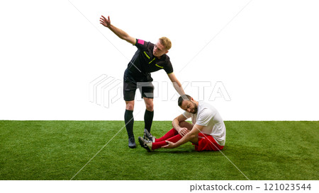 Referee calling for help, standing next to man sitting on floor with injured leg during match, isolated on white background Referee calling for help, standing next to man sitting on floor with injured leg during match, isolated on white background 121023544