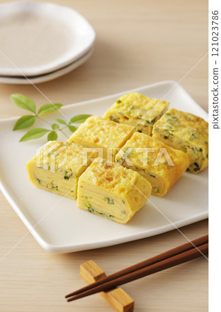 Delicious rolled egg with green onions Delicious rolled egg with green onions 121023786