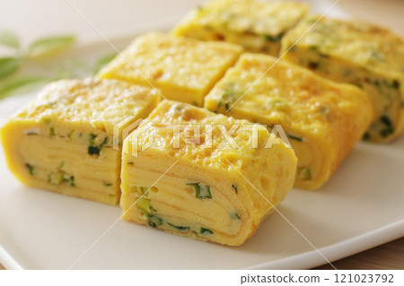 Delicious rolled egg with green onions Delicious rolled egg with green onions 121023792