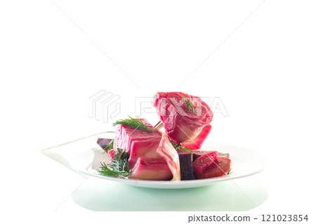 pickled cabbage with beets and carrots, in a plate, isolated on white background pickled cabbage with beets and carrots, in a plate, isolated on white background 121023854