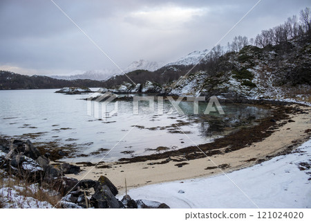 Bay of a Norwegian sea with sand beach, Norway 121024020