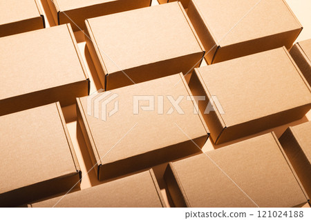 Rows of boxes and copy space over cream background 121024188
