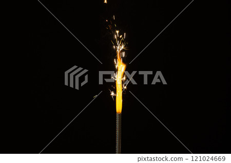Close up of gas lighter with flames and copy space on black background Close up of gas lighter with flames and copy space on black background 121024669
