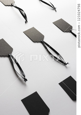 Rows of black price tags with copy space on white background Rows of black price tags with copy space on white background 121024798