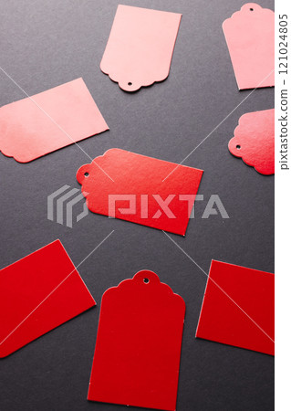 Pink price tags with copy space on black background Pink price tags with copy space on black background 121024805