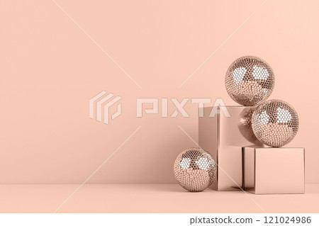 Small mocha mousse beige disco balls are artfully arranged in a geometric pattern with copy space. Modern trendy tone hue shade 121024986
