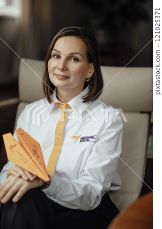 Combining professionalism with creativity through the simple paper airplane 121025371