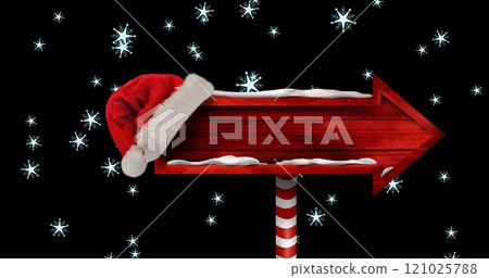 Image of wooden sign with copy space over snow falling 121025788