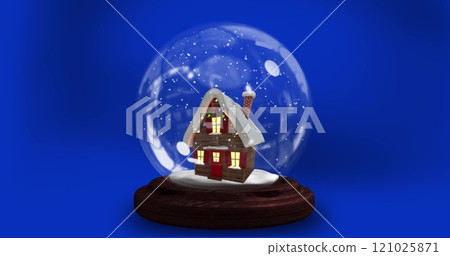 Image of christmas snow globe with house over blue background 121025871